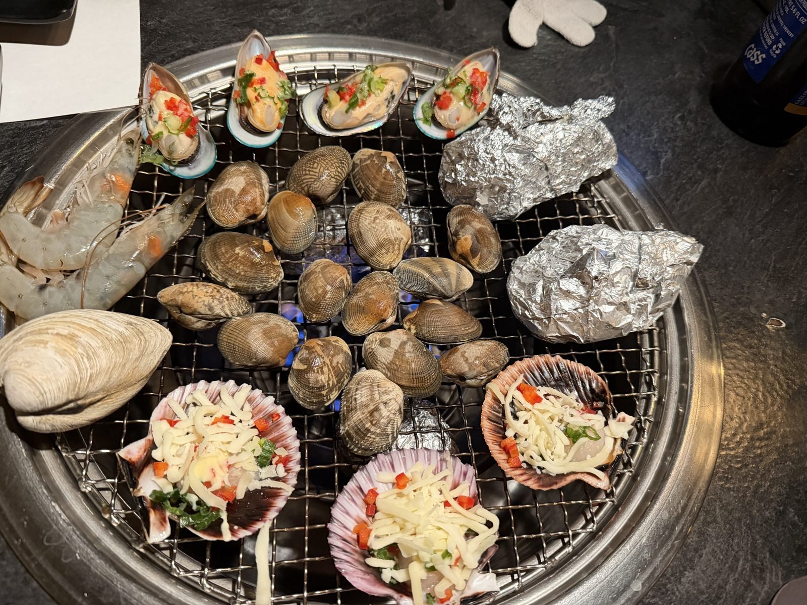 Grilled clams and shellfish at Burnin' Shell, Koreatown LA