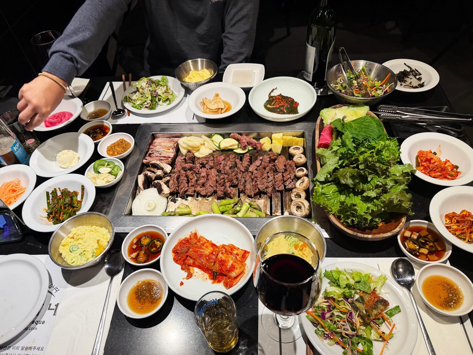Table full of meat and banchan