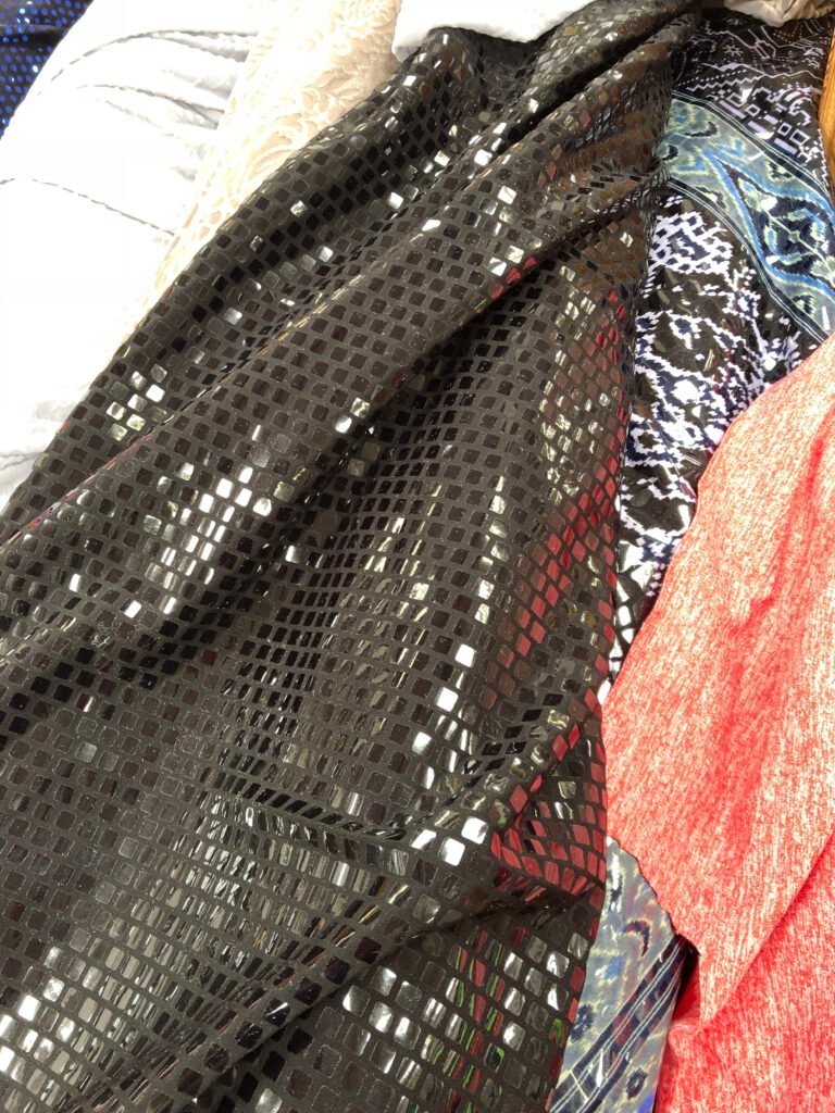 the sequined black fabric