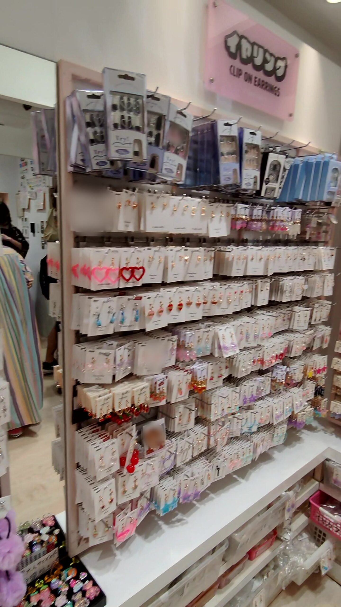 Racks of earrings and clips inside an accessory shop in Harajuku