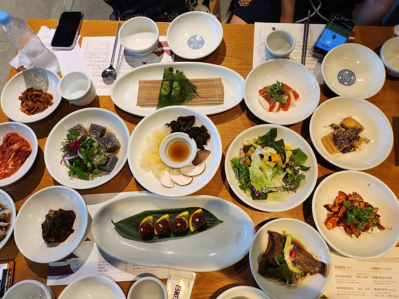 A Korean hansang table set with many small side dishes