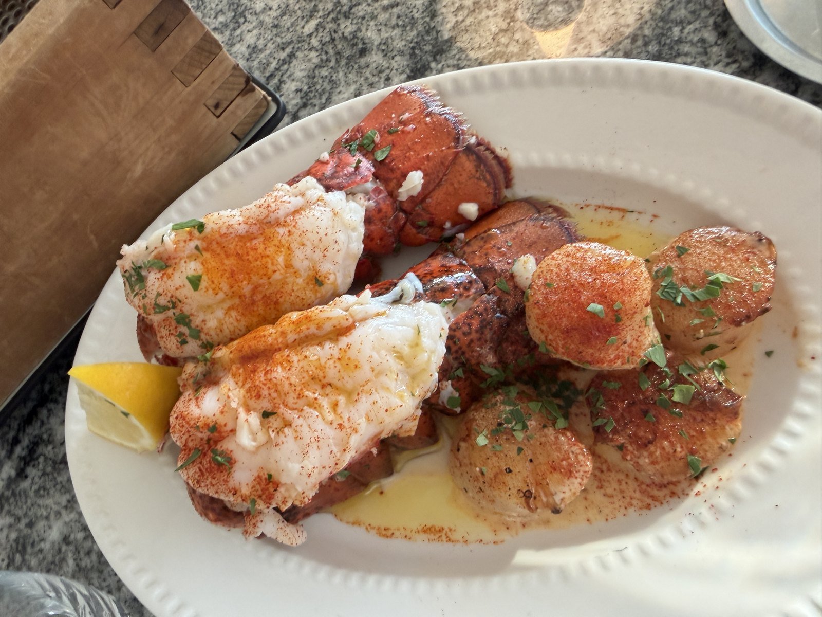 Butter lobster tail and scallops with paprika, parsley and lemon at Crab 52 Seoul
