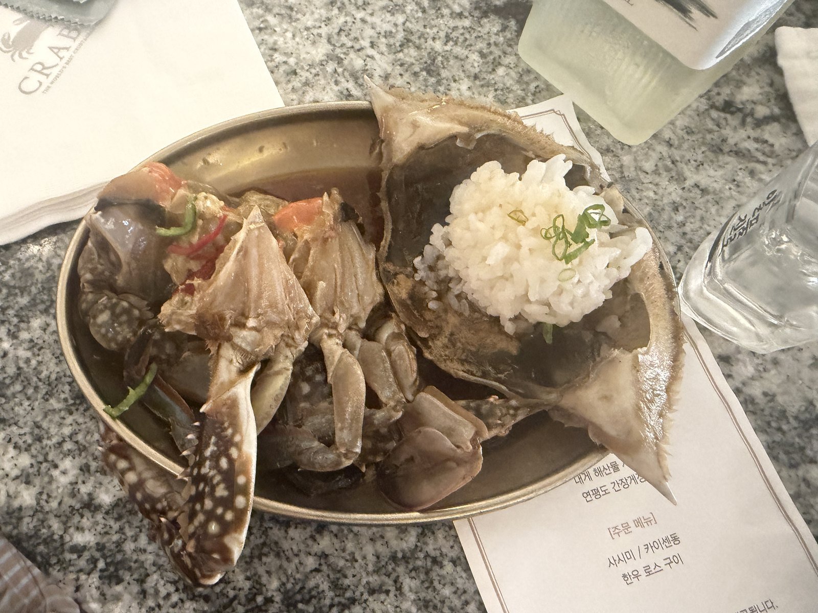 Soy-marinated crab with rice packed into a cleaned crab shell at Crab 52 Seoul