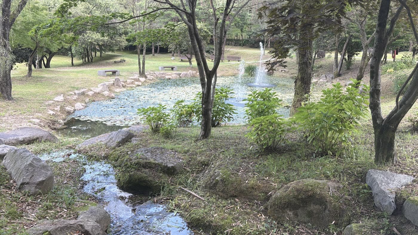A small stream and garden inside the Juknokwon bamboo park in Damyang