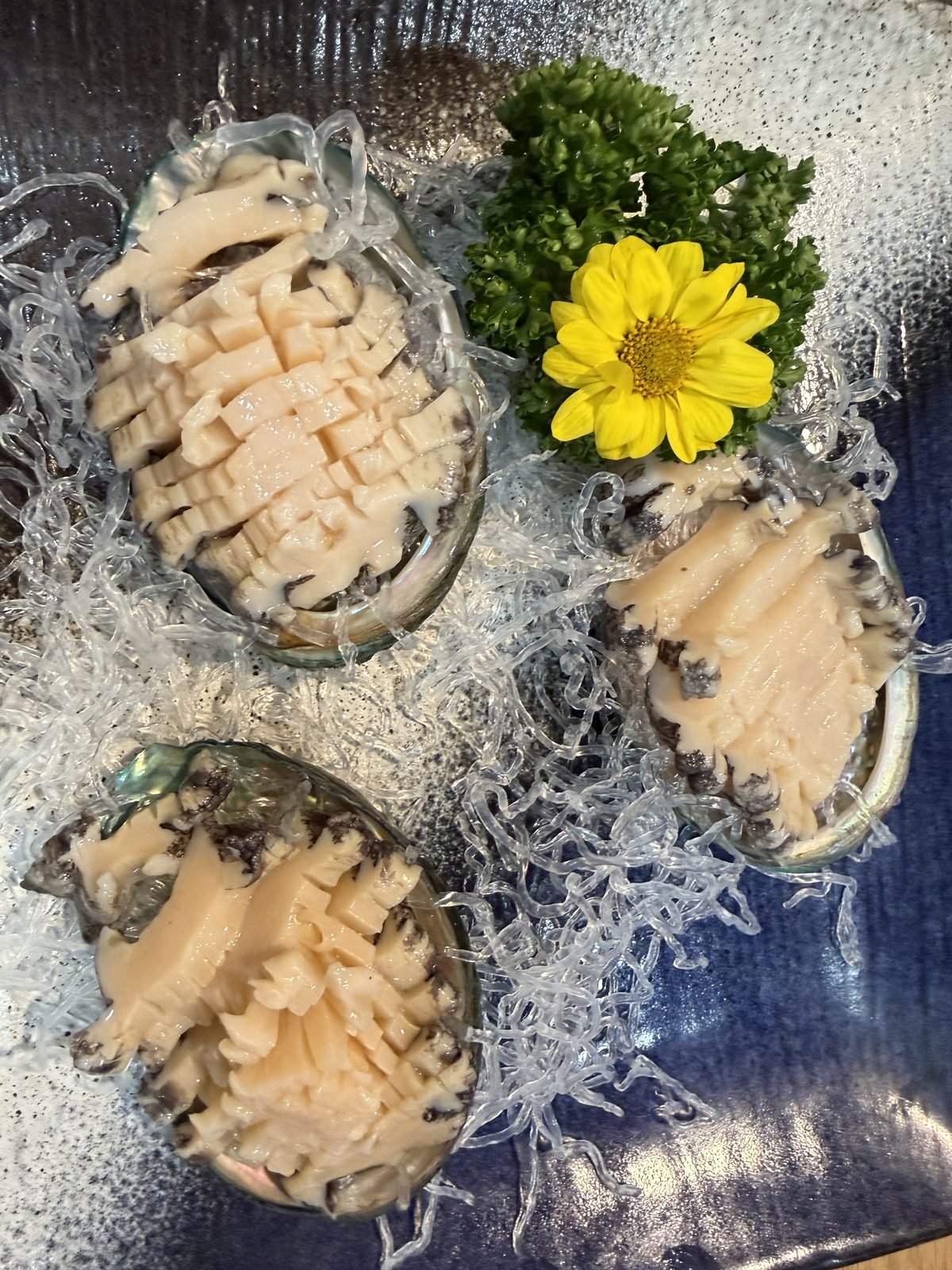 Thinly sliced poached octopus at Gowonnim Seoul