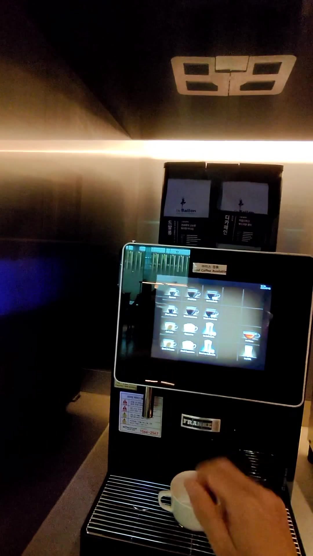 Touchscreen espresso machine at the Korean Air lounge in Incheon Airport