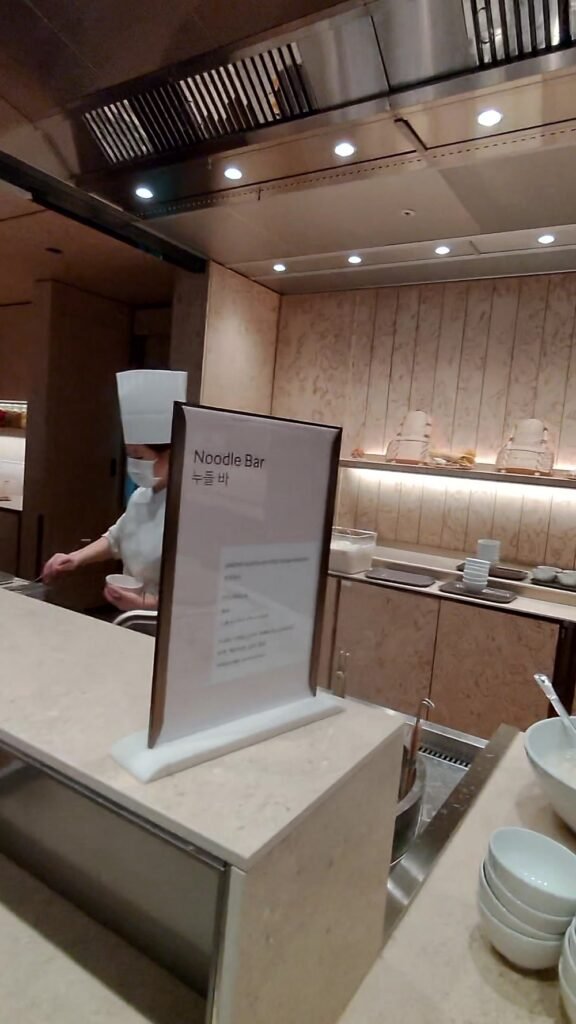 The Noodle Bar sign on the counter at the Korean Air lounge in Incheon Terminal 2