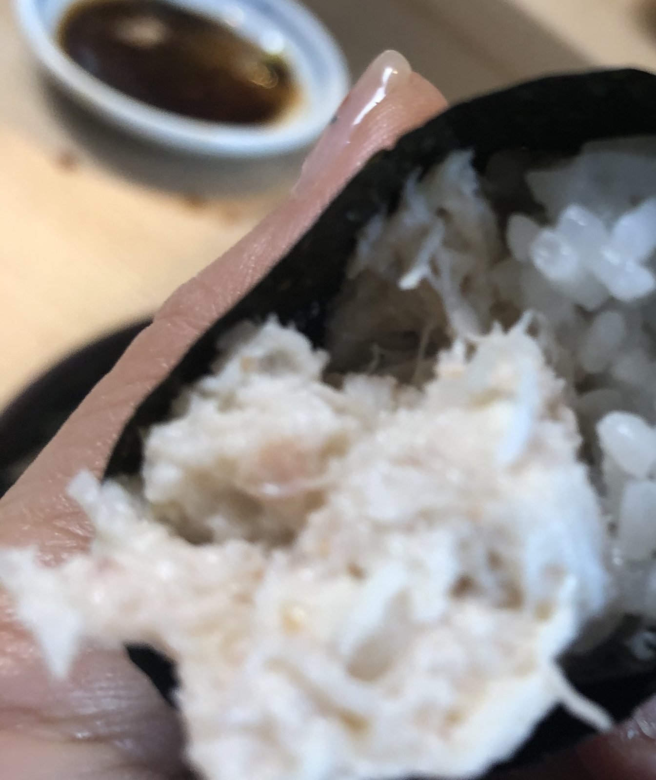 Beverly Hills Sasabune blue crab hand roll packed with shredded crab and warm rice