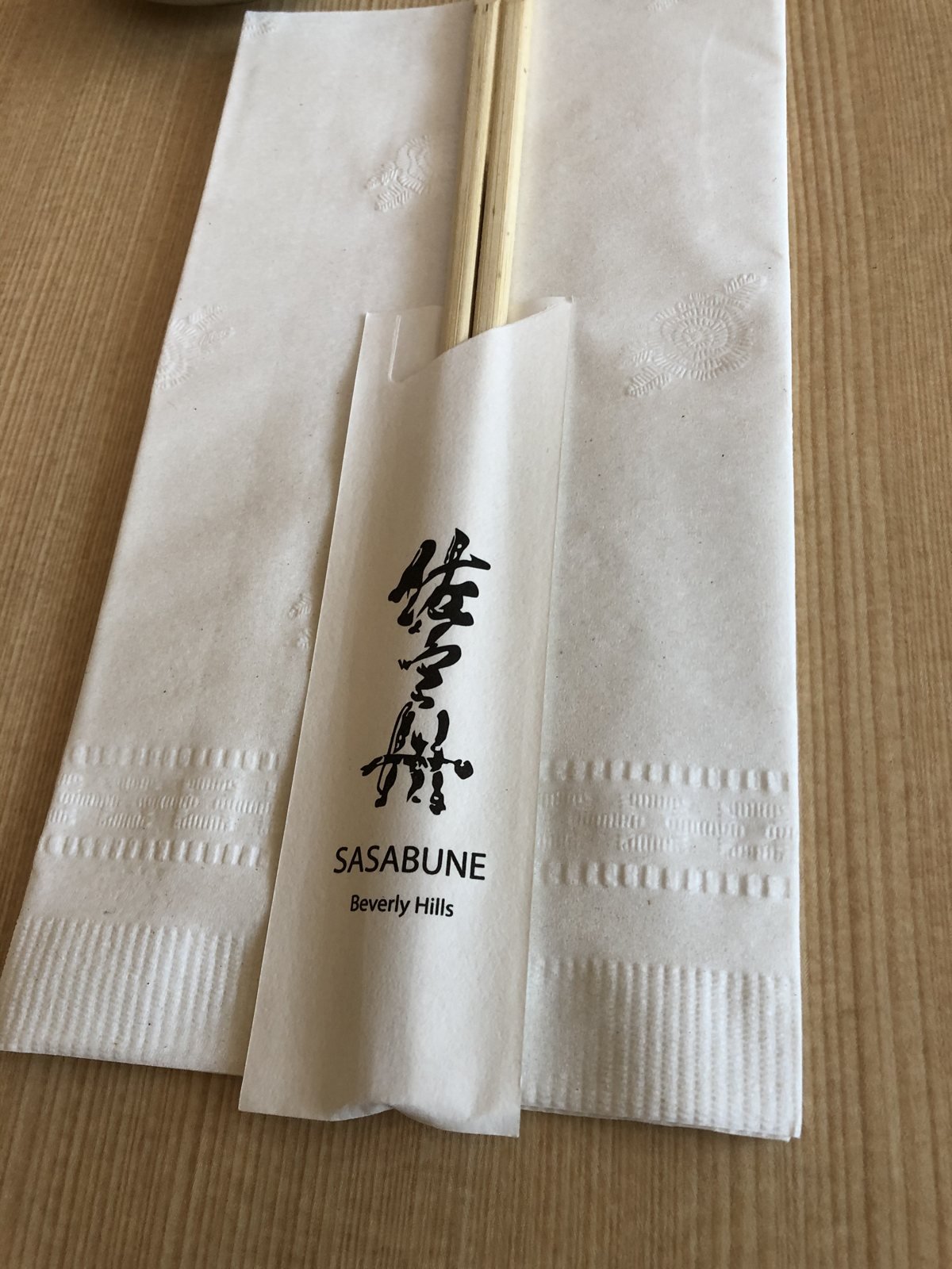Beverly Hills Sasabune chopstick sleeve printed with the restaurant name
