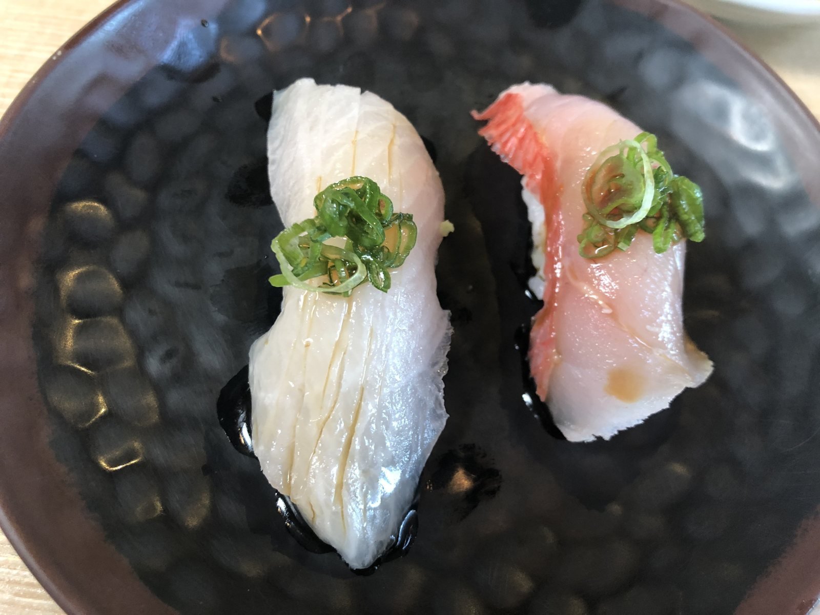 Beverly Hills Sasabune two nigiri topped with chopped scallion