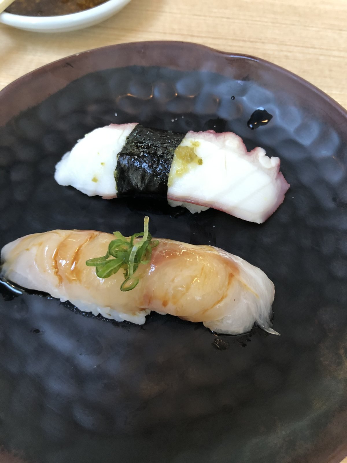 Beverly Hills Sasabune octopus nigiri with nori band and sweet shrimp nigiri