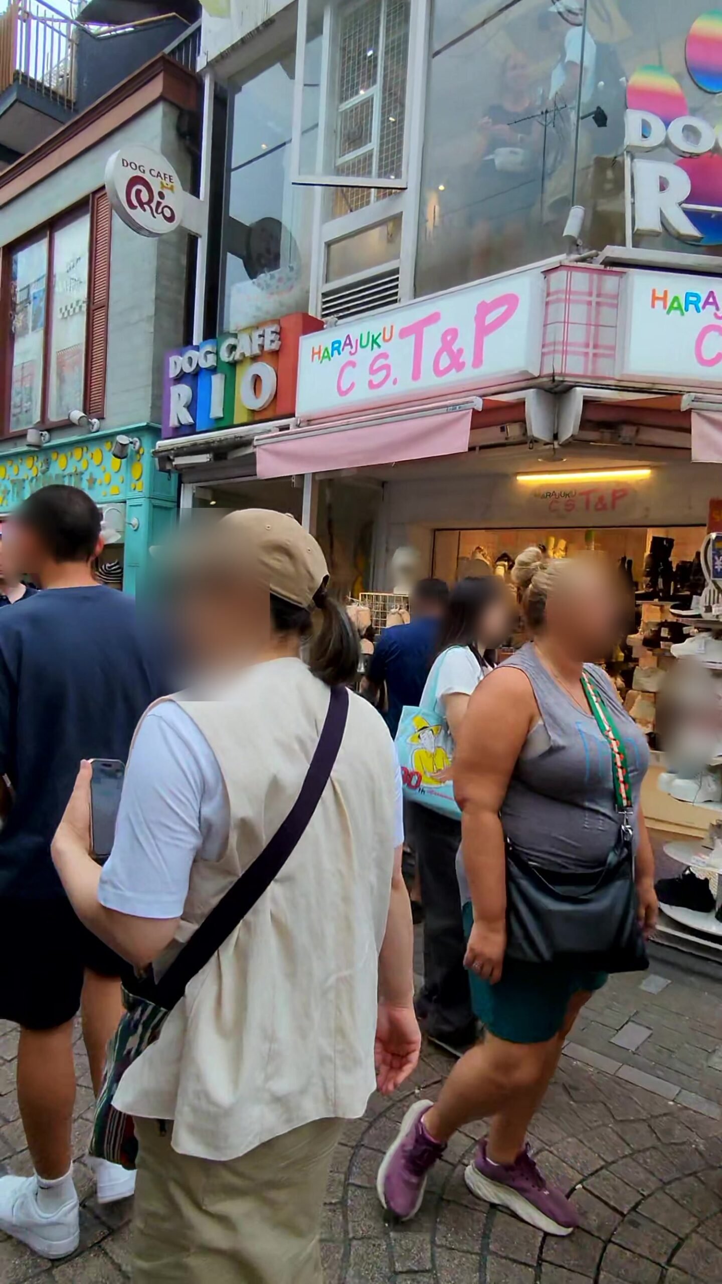 Shopfronts and umbrellas along Takeshita Street in Harajuku