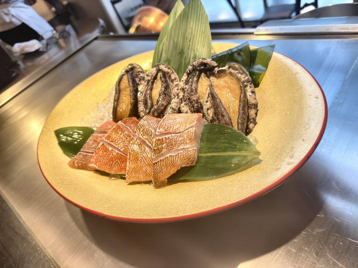 Tokyo Ginza Ukai-tei abalone and fish shown before grilling