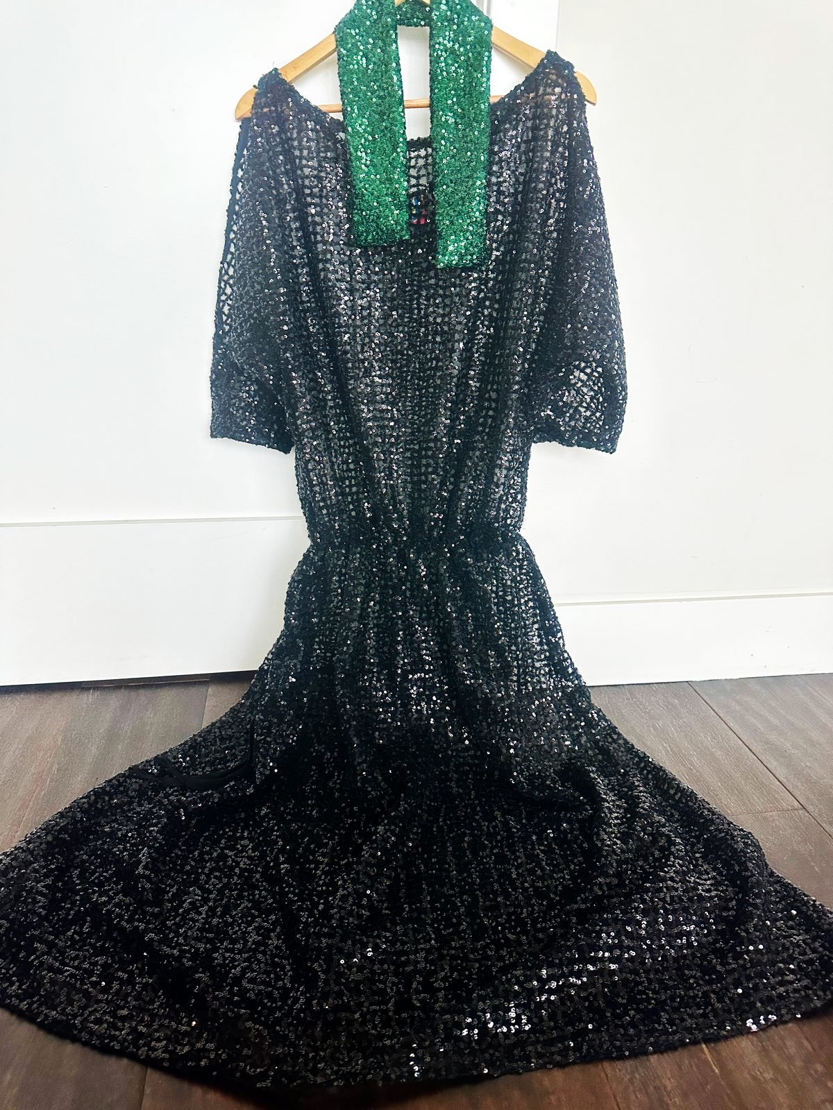 Handmade black sequinned gala gown with a train and an elastic waist