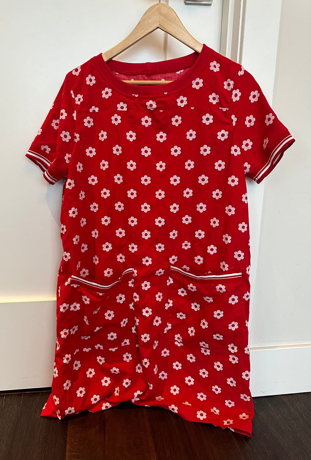 Handmade red knit dress with small white daisies, sewn from forty-year-old fabric