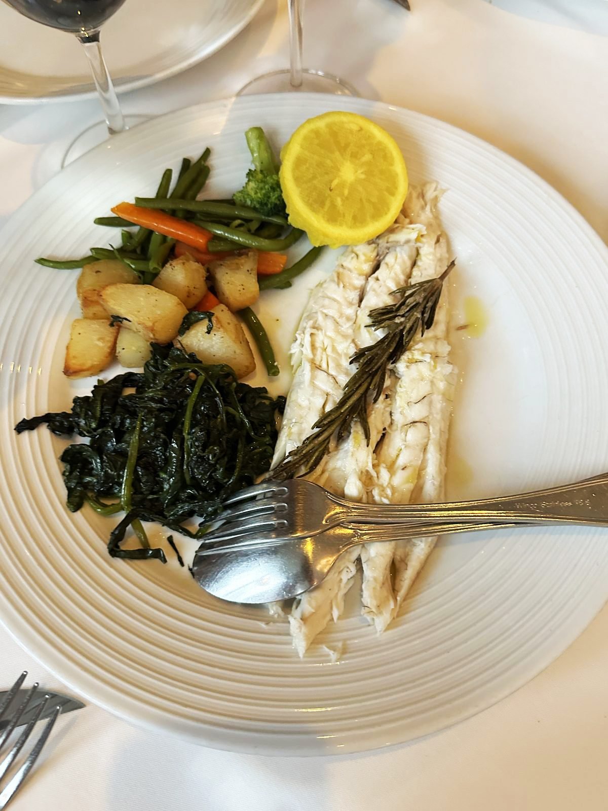 West Hollywood Madeo Ristorante grilled branzino filleted with rosemary, spinach, potatoes and vegetables
