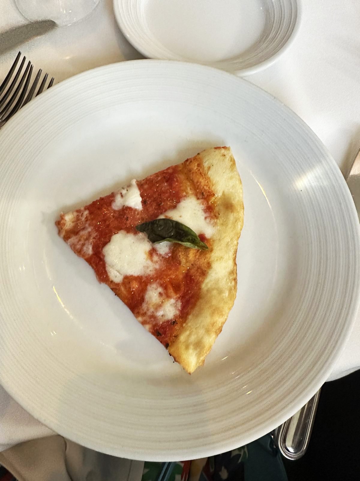 West Hollywood Madeo Ristorante thin crust pizza margherita slice with basil